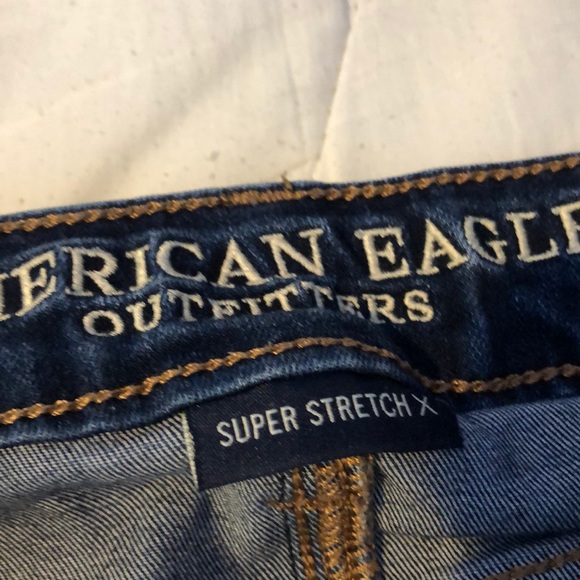 distressed dark wash jeans - Picture 4 of 5